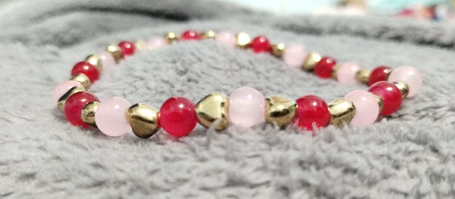 red/pink/heart bracelet