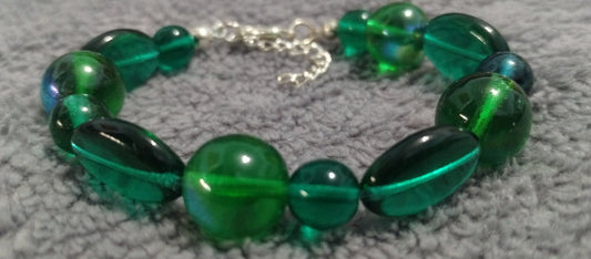 funky clear and green bracelets